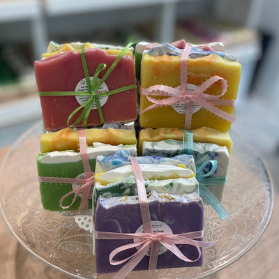 We are loved for our soaps and here is why: Handmade in small batches, using beautiful ingredients…starting with organic oils of olive, coconut, and shea butter, along with pure essential oils, botanicals & micas for colour. You can use our soaps to effectively and gently clean your face, body & hair.